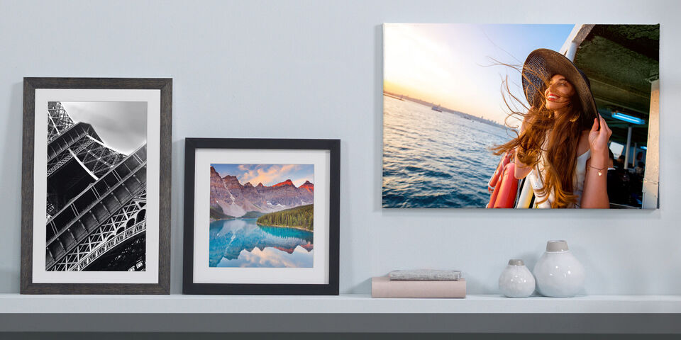 canvas print and framed prints on a wall